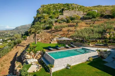 an aerial view of a villa with a swimming pool at Sea View Villa whit Pool in Scopello