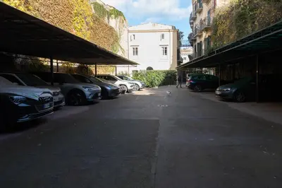 a row of cars parked in a parking lot at Dimora Artale in Cattedrale in Palermo
