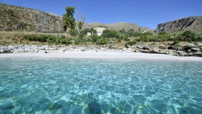 a view of a beach from the water at Villa Antico Pozzo piscina privata SPA in Castellammare del Golfo