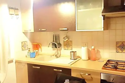 a kitchen with a sink and a counter top at Palermo Al Capo in Palermo