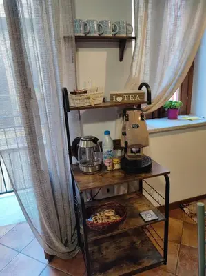 a kitchen with a table with a mixer on it at Palermo Al Capo in Palermo