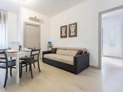 a living room with a couch and a table at Apartment La Casetta di Clò by Interhome in Palermo