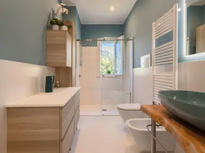 a bathroom with a sink and a toilet and a shower at Apartment Quirat Superior by Interhome in Terrasini