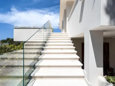 a set of stairs leading up to a house at Apartment Quirat Superior by Interhome in Terrasini