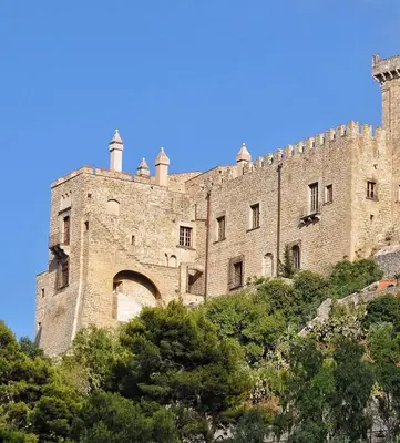 a large castle sitting on top of a hill at Sikelìa Bed & Breakfast in Carini