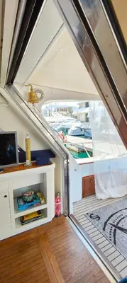 an open stairway in a boat with a window at Panaby - House Boat in Palermo