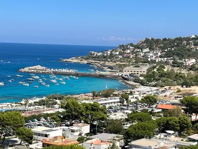 a view of a harbor with boats in the water at Porta Addaura in Palermo
