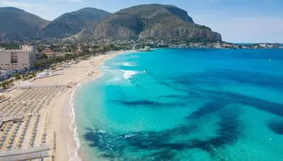 an aerial view of a beach and the ocean at Porta Addaura in Palermo
