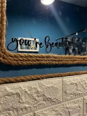 a mirror with a sign that reads your are beautiful at Tiny house in Palermo