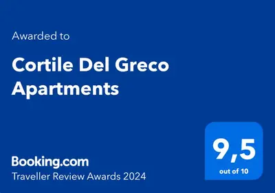 a blue sign with the text cancelled to gorilla del greco apartments at Cortile Del Greco Apartments in Palermo
