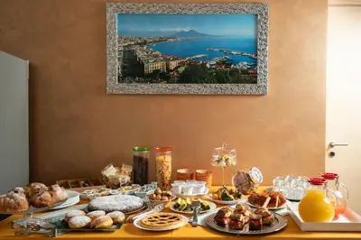 a table with a bunch of food on it at B&B Pietre Preziose in Castelluzzo