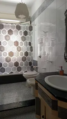 a bathroom with a toilet and a sink and a shower at BBX Palermo Centro in Palermo