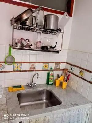 a kitchen counter with a sink in a kitchen at Quiet and comfortable apartment in Palermo city centre in Palermo