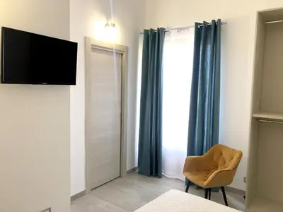 a shower in a bathroom with a toilet at I MORI - Holiday Rooms in Lascari
