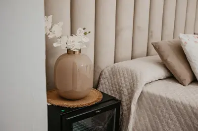 a vase sitting on a table next to a couch at Borgo La Chiusa in Cinisi