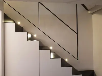 a staircase in a building with lights on it at appartamento politeama in Palermo