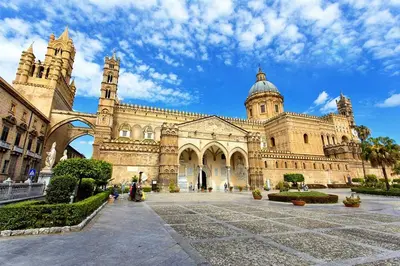 a large stone building with a dome on top at Pothos House in Palermo