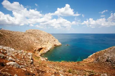 a view of the ocean from the side of a cliff at Easy Room Holiday in Castellammare del Golfo