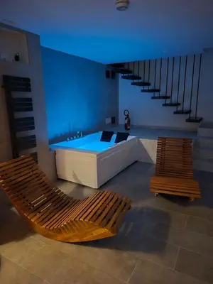 a large bathroom with a tub and a shower at Villa Stesicoro Suite in Mondello