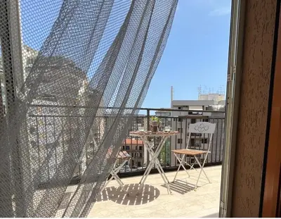 a view from the balcony of a building with a table at Petrocelli 364 in Palermo
