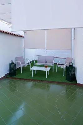 a group of chairs and a table in a tent at Ischia suite in Termini Imerese