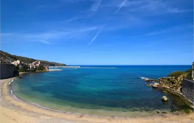 a view of a beach with blue water at 3 Bedroom Gorgeous Home In Trappeto in Trappeto