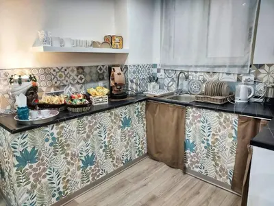 a kitchen with a counter with food on it at La Casa del Moro - All' Operà in Palermo
