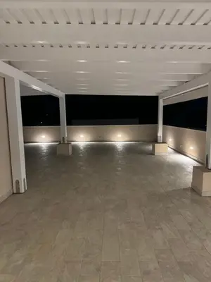 a large empty room with a tile floor and white ceilings at Coral Sand bed and breakfast in San Vito lo Capo