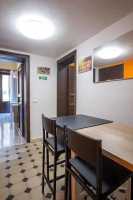 a bathroom with a sink and a toilet and a shower at CORNER ROME appartamento in Palermo