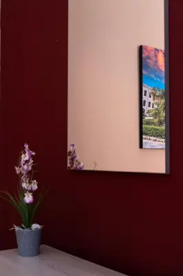 a orange room with two beds and a picture on the wall at CORNER ROME appartamento in Palermo