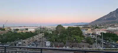 a view of a city with a bridge in the background at Antica Dimora in Termini Imerese