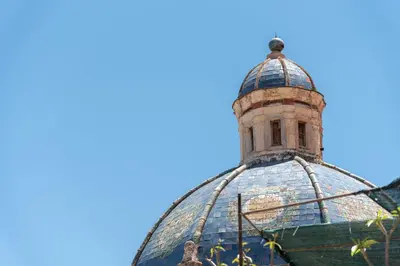 a glass dome of a building with a tower at La mia deliziosa Casetta di giù in Termini Imerese