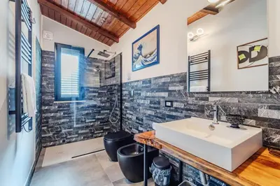 a bathroom with a sink and a shower at Duplex House in Palermo