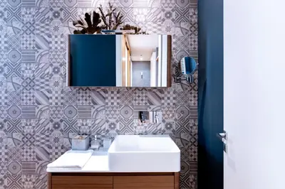 a bathroom with a sink and a mirror at Oliveri Vintage House at Politeama in Palermo