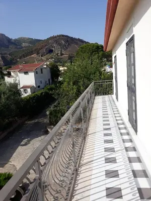 a balcony with a view of a mountain at Casa vacanze zina in Altavilla Milicia