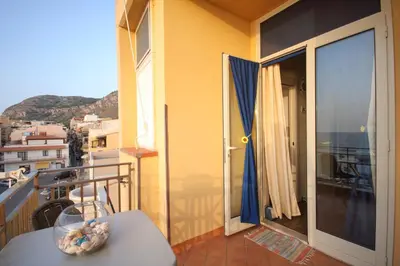a balcony with a view of a city at La casa di Jack in Bagheria