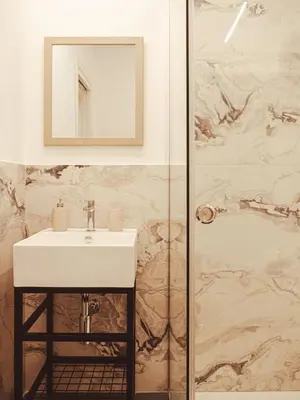 a bathroom with a sink and a shower at U Zuccareddu in Alcamo