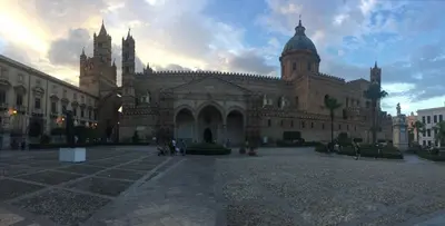 a large building with two towers on top of it at PalermHost in Palermo