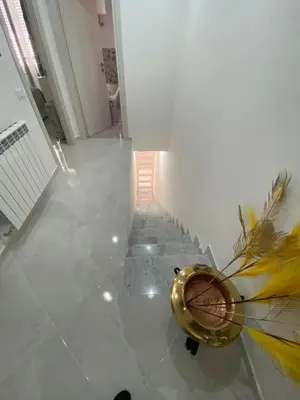 a golden drum sitting on a floor in a room at Casa vacanza solemare in Balestrate