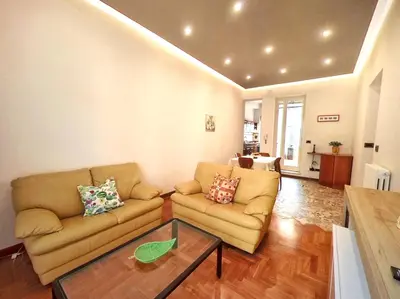 a living room with a couch and a table at Annacati House Centro Storico in Palermo
