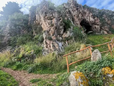 a mountain with a wooden fence on the side of it at Casa Vacanze Villa Ale in Altavilla Milicia