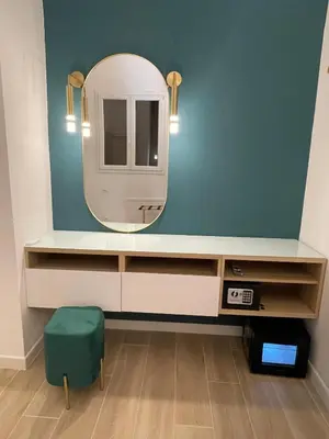a bathroom with a sink and a mirror at Martanna Rooms in Carini