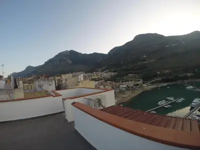 a view of a harbor with boats in the water at Casa Vacanza Terrazza sul Mare in Castellammare del Golfo