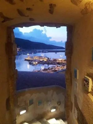 a view of a harbor from a window at Casa Vacanza Terrazza sul Mare in Castellammare del Golfo