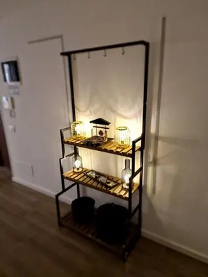 a shelf with lights on it in a room at L'Incanto centrale in Palermo