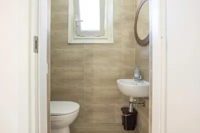 a bathroom with a toilet and a sink at L'Incanto centrale in Palermo