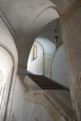 an archway in a building with stairs and a window at Room in Villa Galletti Inguaggiato in Bagheria
