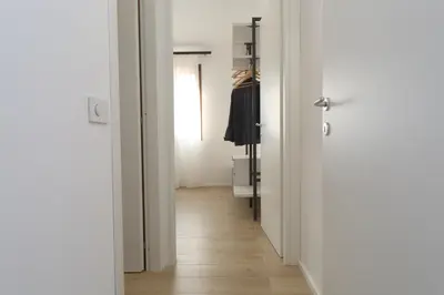 a hallway with a door leading to a closet at Villa Memi in Cefalù