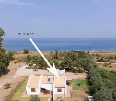 an aerial view of a house with a windmill at Villa Memi in Cefalù