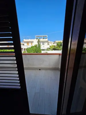 a view from the door of a balcony at IsolaHome in Isola delle Femmine